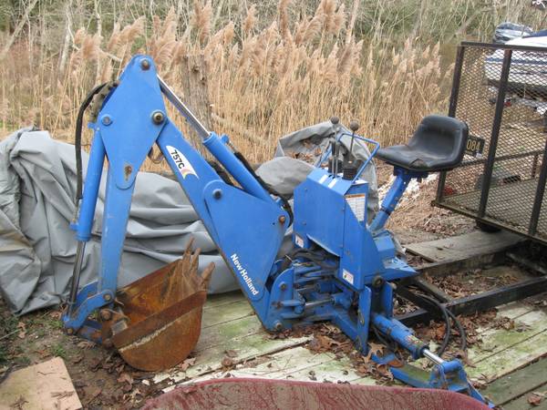 File:FNew Holland 757 C backhoe attachment 32 5a9fa0de98ef6.jpg